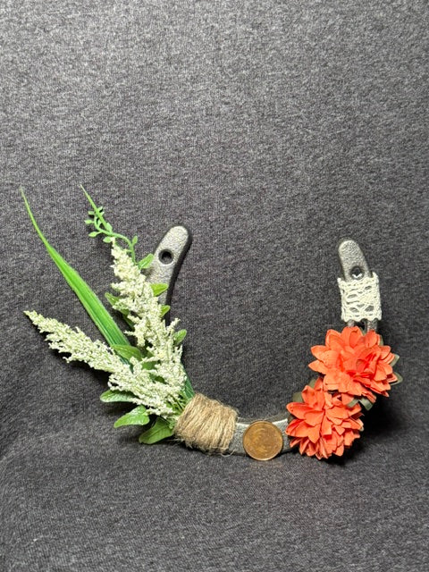 One-of-a-kind Lucky Penny Horseshoe with white greenery, orange flowers and lace detail